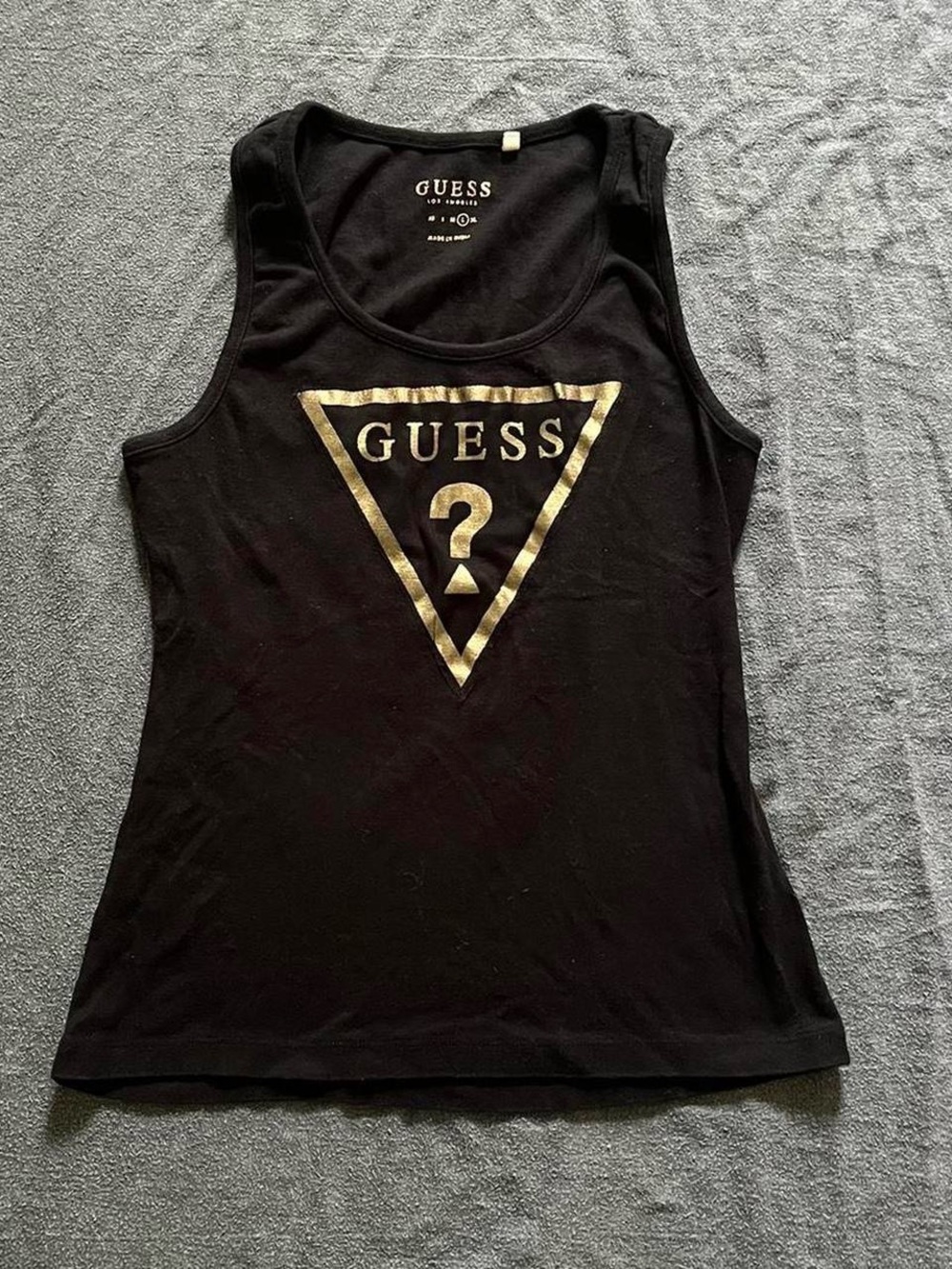Guess black tank top with gold triangle logo
